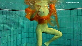 Nastya Strips Naked and Shows Hot Petite Body in Public Pool