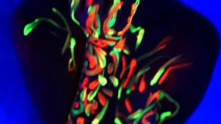 Redhead Amelia masturbates to music with painted body