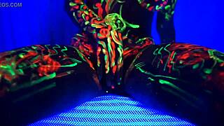 Redhead Amelia masturbates to music with painted body