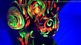 Redhead Amelia masturbates to music with painted body