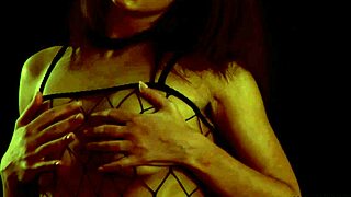 A filthy yet classy Russian model fingers herself in fishnets