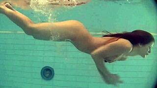 Natalia Kupalka shows off her bikini body in the pool