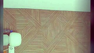 the colombian chick starts stripping and playing with her trimmed pussy and ass