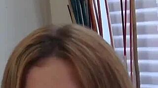 petite redhead in classroom with glasses