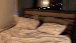 Hey, check this lustful babe licking balls with a butt plug in!