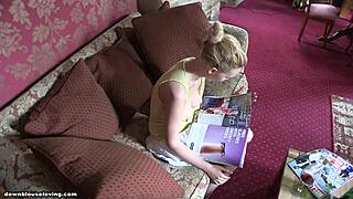 Sexy housewife browses magazines practically topless on hidden cam