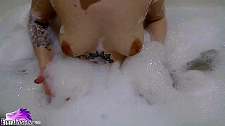 Cute Babe Sloppily Sucks Huge Dildo in Foamy Bath