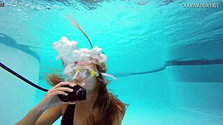 Stunning Brunette Babe Katya Nakolkina Dives into Tight Underwater Action.