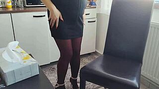 Teen striptease in pantyhose at window, playing with object