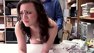 dark haired teen bent over by police officer