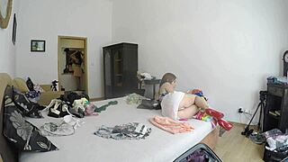 Antonia poses in heels and underwear for a voyeur college shoot.