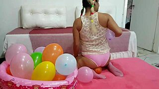 Naughty Latina teen plays with big ass balloon fetish