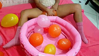 Naughty Latina teen plays with big ass balloon fetish