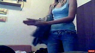 young teen undresses on webcam, performing striptease with clothes being ripped in amateur free porn video