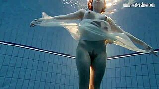 i can’t stop staring at dark-haired teen andrea’s hot ass floating in the pool.