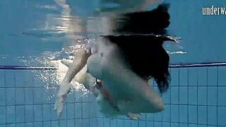 i can’t stop staring at dark-haired teen andrea’s hot ass floating in the pool.