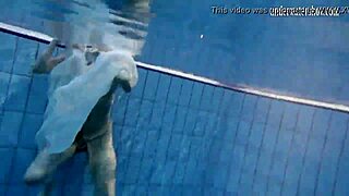 i can’t stop staring at dark-haired teen andrea’s hot ass floating in the pool.