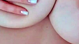 busty beauty teases big nipples on camera while parents sleep just behind