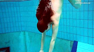 Underwater mermaid Vesta, a horny teen, teases in bikini by the pool