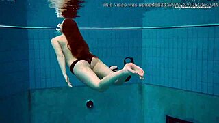 Underwater mermaid Vesta, a horny teen, teases in bikini by the pool