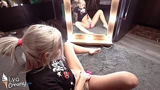 Sexy blonde masturbates with sex toys at the mirror for intensive orgasm