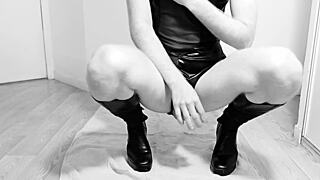 A young gay man masturbates with his hand in his anus