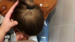Petite 18+ European couple with big tits gets dirty in university bathroom.