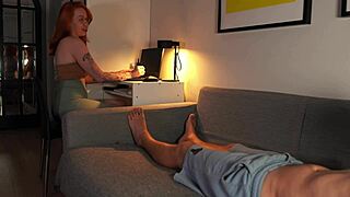 Nerdy redhead exposes tits while deepthroating cock in hot scene.