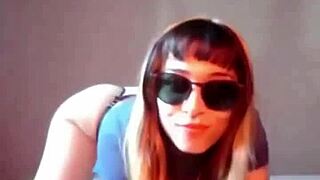 I am bonneyuwu inserting marbles into a condom on the bed