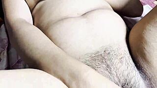 College girl sensually fingers her tight pussy.