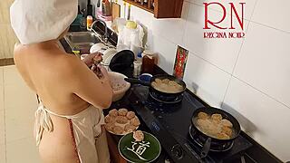Nudist Housewife Regina Noir Cooks in the Kitchen with Naked Maid Assistance in Chapter One.
