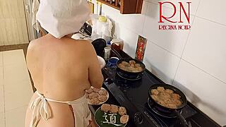 Nudist Housewife Regina Noir Cooks in the Kitchen with Naked Maid Assistance in Chapter One.