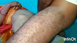 Newly married indian couple kisses and blows husband