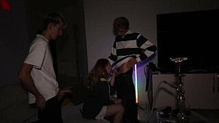 a cute slut got fucked in the mouth and pussy by three cocks at a party