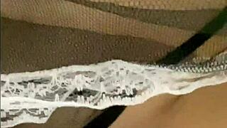 A curvy Filipina maid rams monster dildo deep in shaved pussy on bed